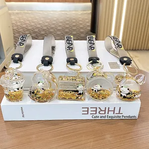 Porte-clés panda avec paillettes mobiles et bracelets en caoutchouc pour sacs