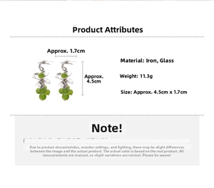 Detail view of green glass flower earrings with 4.5cm length and metal finish measurements