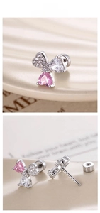 Detailed view of heart-shaped zircon butterfly studs with secure screw-back closures