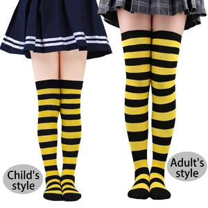 Knit striped over-knee socks in yellow and black for children and adults