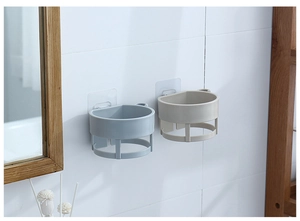 Macro detail of wall-mounted hair dryer holder on white tiles with adhesive backing