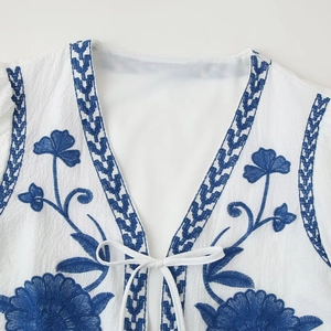 Vintage white embroidery cardigan for women with blue floral patterns and lace-up V-neck