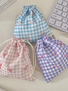 Three Gingham drawstring bags in blue, pink, and lilac with lovely bow patterns