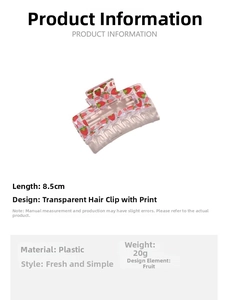 Détail d'une pince à cheveux fraise montrant la longueur de 8,5 cm et le matériau plastique