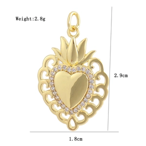 Detail view of 18K gold plated sacred heart pendant with zircon and dimensions 2.9x1.8cm