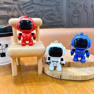 Stress relief cartoon astronaut robot keychains for backpacks in red white and blue