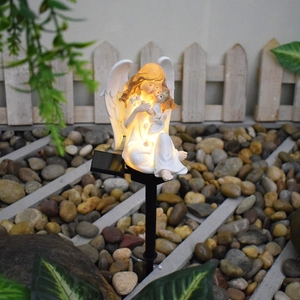 Solar outdoor garden light with angel statue in ivory resin for landscape decor