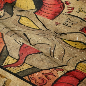Close-up of the soft velvet texture and vibrant graphic print on the tapestry fabric