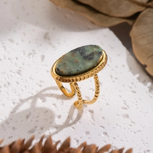 Vintage golden stainless steel open ring with oval green natural stone on stone plate