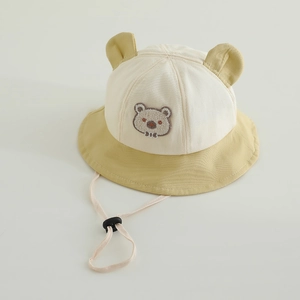 Detail of baby sun hat with cute bear ears, towel embroidery and adjustable wind rope