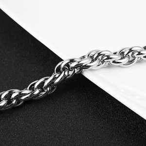 Chic twisted silver stainless steel woven chain bracelet for women in a layered style