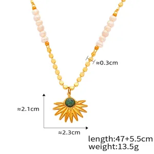 Detailed view of beaded pearl necklace with sunflower pendant and product measurements