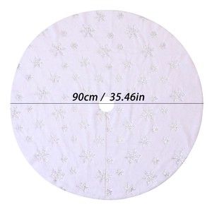 Detail of 90cm white plush Christmas tree skirt with silver sequin snowflakes