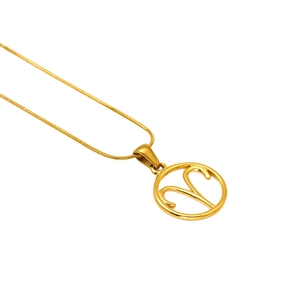 Gold Aries zodiac necklace with a round cutout pendant on a sleek snake bone chain