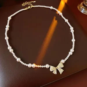 Elegant Bow Pendant Necklace With Artificial Pearl And Zircon In Copper French Retro Style Adjustable Link Chain For Women