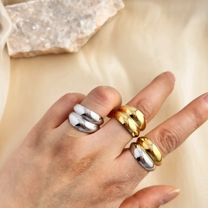 Polished stainless steel wide band geometric rings in gold, silver, and two-tone finishes