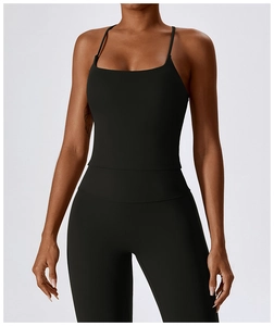 Front view of black racerback sports camisole and high-waisted leggings on a model