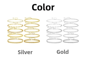 Detail view of 10-piece gold and silver bracelet set with Cuban and Figaro link chains