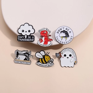 Set of 6 fun enamel pins featuring sewing machines and humor quotes on white trays