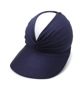 Close-up of dark blue sun hat featuring pleated texture and elastic wide brim design
