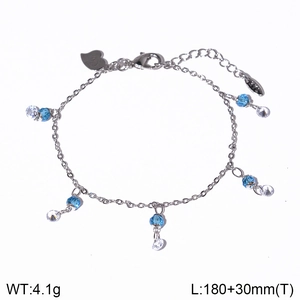 Detail of silver chain bracelet with blue faceted beads and weight length specifications