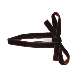 Classic dark brown velvet bow hair clip with silver metal base on white background