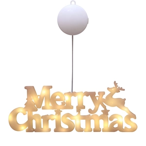 Luminous Merry Christmas LED sign with reindeer silhouette and warm yellow lighting