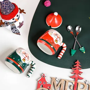 Close-up of Santa ceramic mugs with 3D faces, striped handles and Christmas hat lids