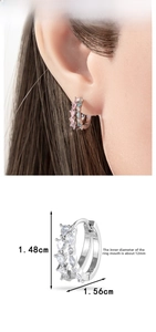Detail view of double hoop earrings with cubic zirconia and 12mm inner diameter dimensions