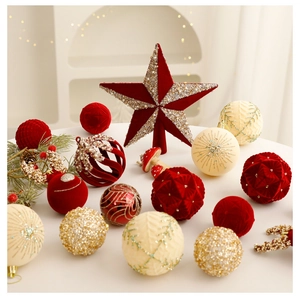 Detailed close-up of festive red flocked star topper and assorted glittery Christmas baubles