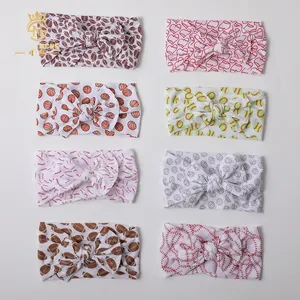 Detail of 8 different sports and heart patterns on soft nylon baby bow headbands