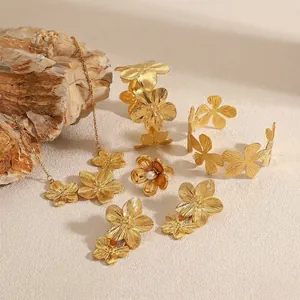 Exquisite gold stainless steel flower jewelry set with necklace, bracelets and rings