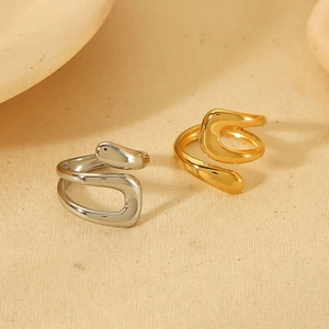 Minimalist 18k gold and silver irregular open rings with a fluid aesthetic for women