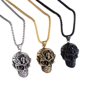 Punk style skull pendants in silver, gold, and black colors with classic box chains