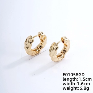 Detailed view of 1.5cm golden irregular hammered metal hoop earrings with dimensions