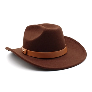 Detailed view of brown felt cowboy hat with leather band and gold metal rivet accessory
