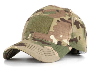Detail of woodland camouflage tactical baseball cap showing ripstop fabric and front velcro patch
