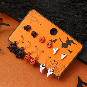 6-pair Halloween earring set featuring pumpkin, ghost, and spider motifs on orange card
