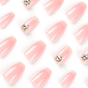 Pink gradient ballerina press-on nails with luxury rhinestones on a white background