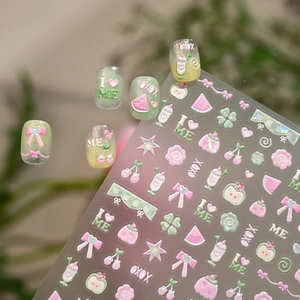 3D embossed sweet nail stickers with pink bows and fruits displayed on soft natural background