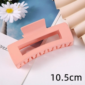 Pink matte rectangular hair claw clip for women, stylish large hairpin for thick hair styling.