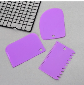 Three-piece purple plastic dough scraper set with serrated and flat edges for baking