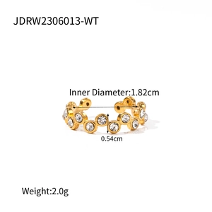 Detailed view of wavy gold ring with inset round zircons and product dimensions