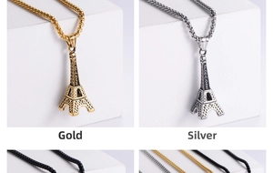 Eiffel Tower titanium steel pendant necklace in gold and steel finish on white display