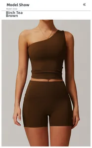 Detail view of one-shoulder yoga vest and high-waisted shorts with side pockets in brown