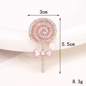 Lollipop brooch detail showing 3x5.5cm dimensions and pink rhinestones with pearls