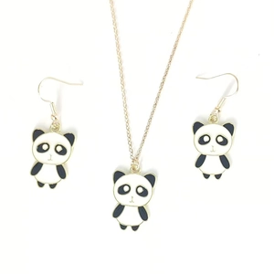 Minimalist Kung Fu Panda jewelry set with black and white enamel necklace and earrings