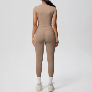 Rear view of brown tight yoga set showing soft brushed fabric and high waist fitness fit