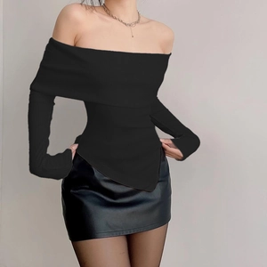 Slim fit black off-shoulder long sleeve knit top with asymmetric triangle hem design