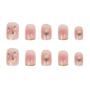 Pink gradient press-on nails with hand-painted yellow tulips and gold tips